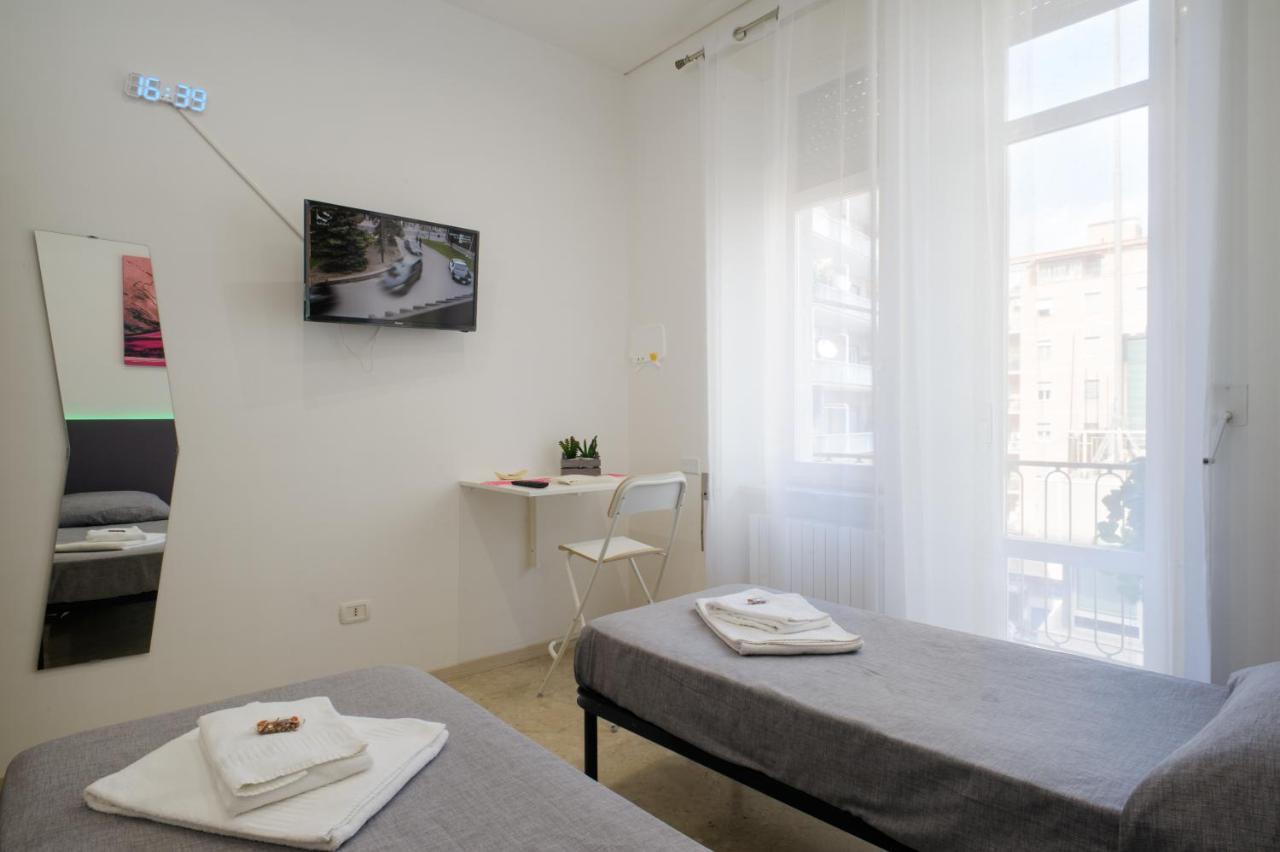 Habitación Doble con baño privado externo - 2 camas