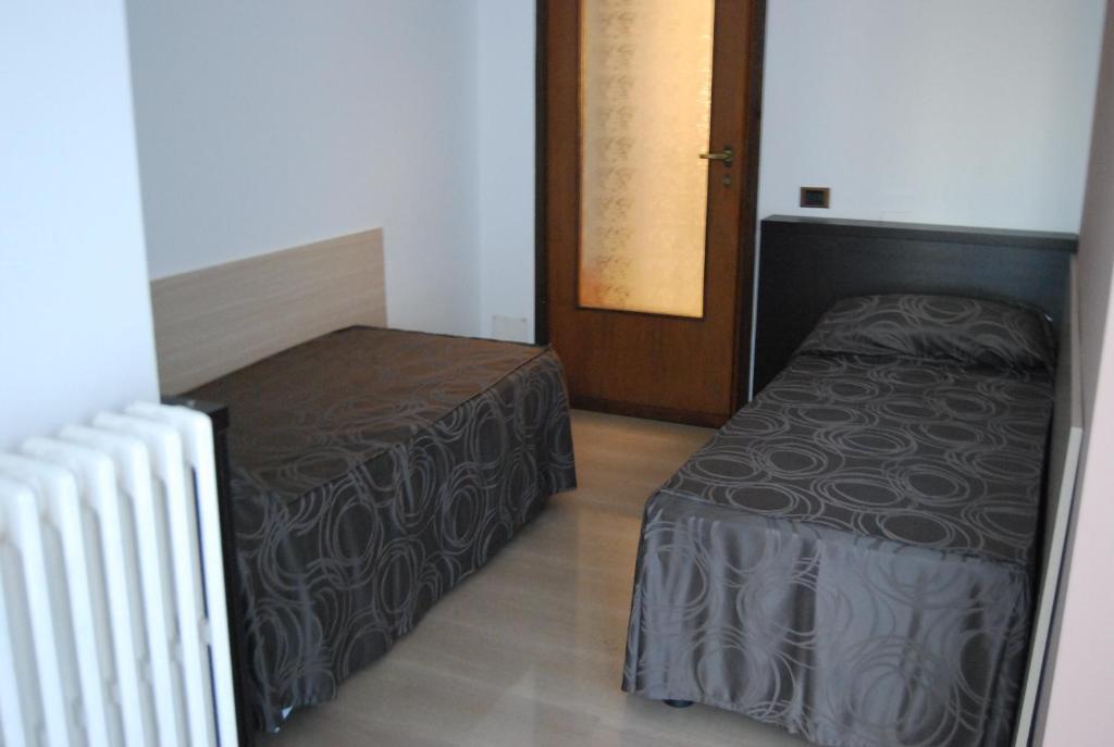 Dreibettzimmer mit Gemeinschaftsbad