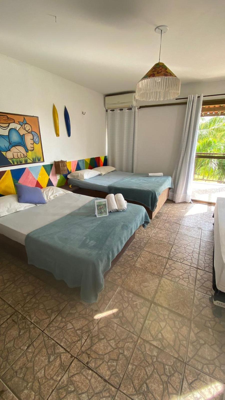 Quarto Triplo com Vista para a Piscina