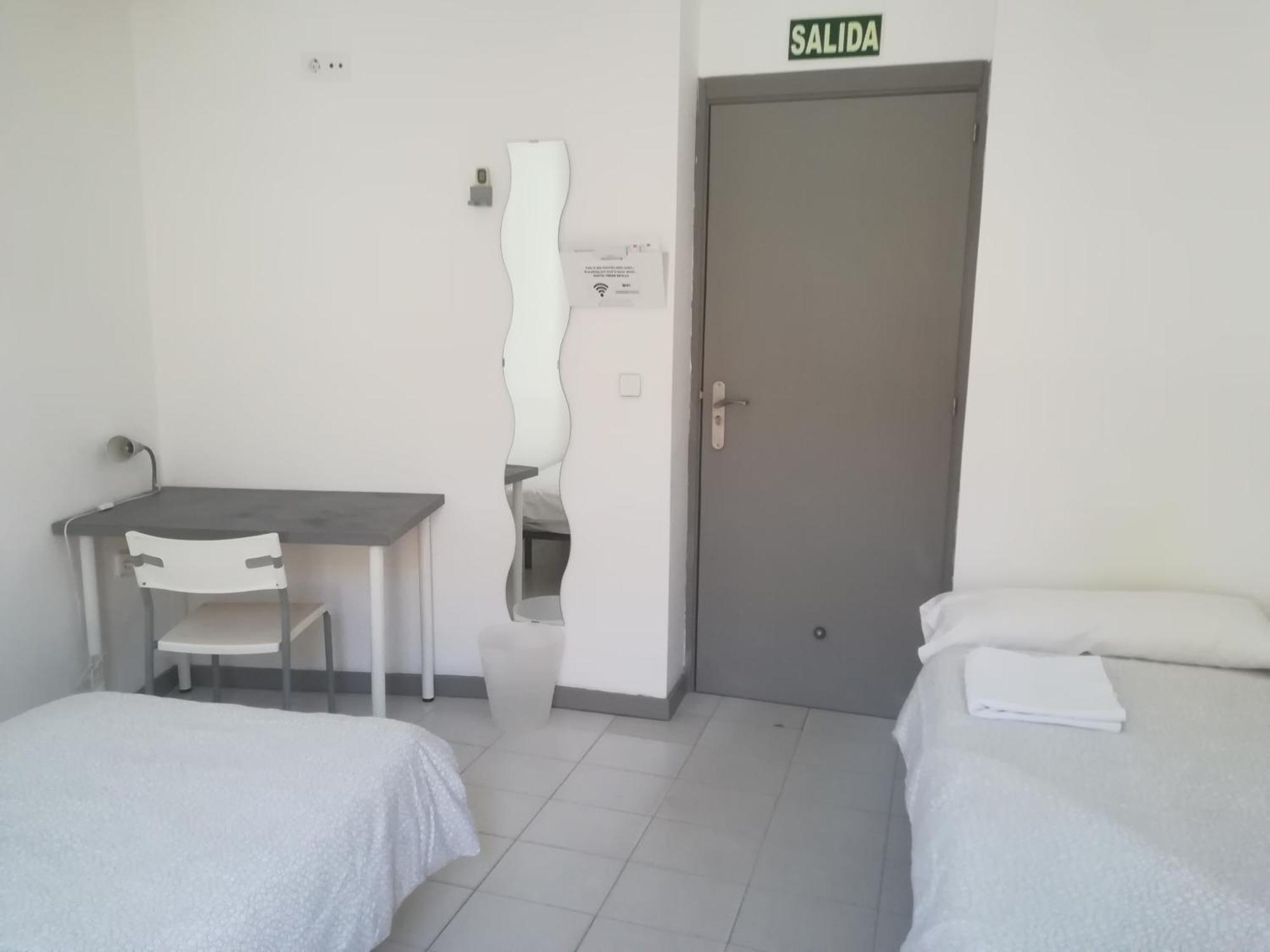 Quarto Twin com Casa de Banho Partilhada