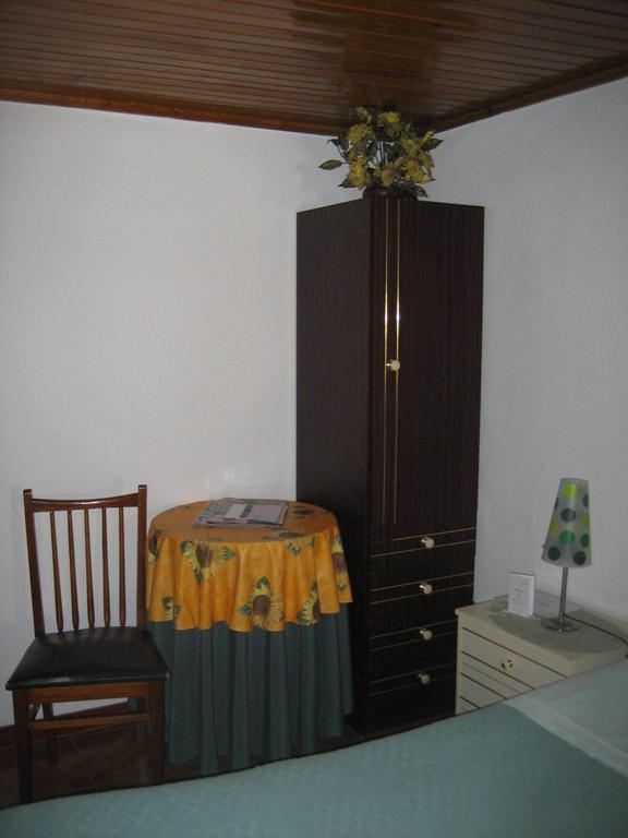 Quarto Individual com Casa de Banho Privativa