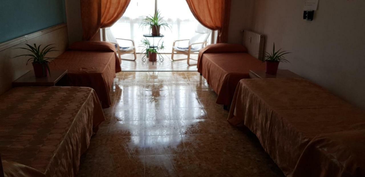 Quarto Quádruplo com Casa de Banho Privativa