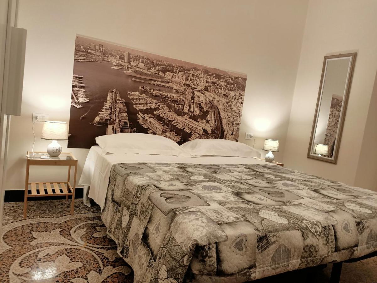 Camera Quadrupla con Bagno in Comune